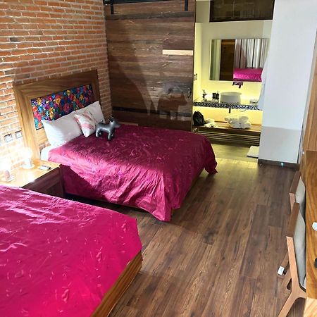 צ'ולולה Hotel Casa Chanehque מראה חיצוני תמונה